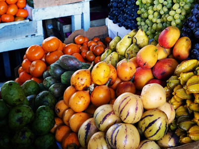 Pepino Dulce and other fruits Pepino Dulce and other fruits - Pepino dulce and other fruits at San Pedro Market in Cusco, Peru