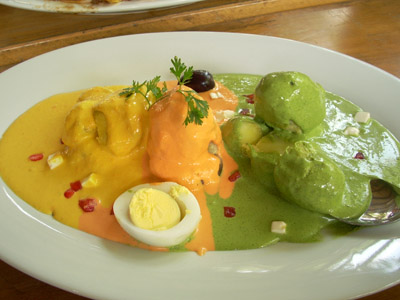Potatoes with rocoto, huancaina, and ocopa sauce - A mix of traditional Peruvian sauces in one dish