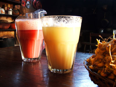 Peruvian Drinks Chicha de Jora and Frutillada  - Chicha de Jora, a home-made fermented corn beer popular throughout the Andes, and Frutillada, the same drink with the addition of strawberries.